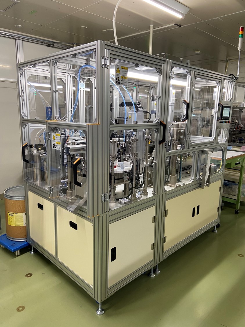 自動接着機